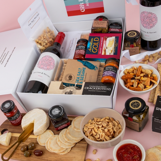 Cheese Platter & wine gift hamper delivered same day.
Cheese platter and gourmet nibbles with shiraz wine gift hamper.