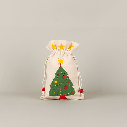 Decorative Christmas sack with Christmas tree design on a beige background