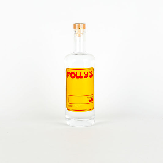 Bottle of Folly's gin with a yellow label on a white background