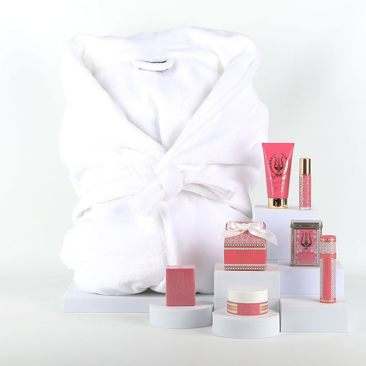Cosmetic products with a white robe on a white background