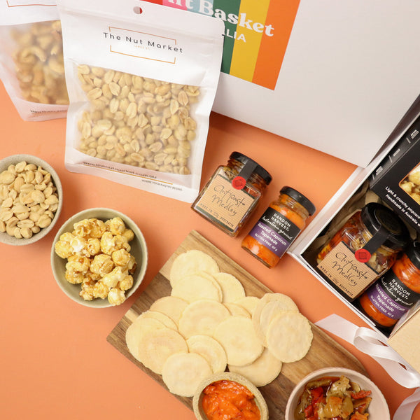 Gourmet gift hamper with olives, antipasti mix, caramel popcorn and nuts