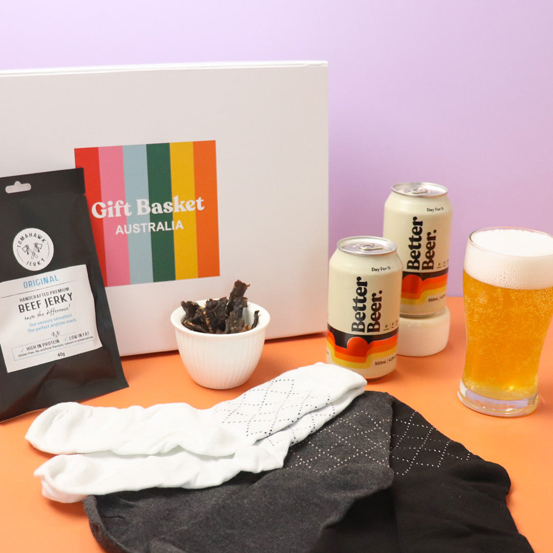A gift hamper with beers, socks and jerky