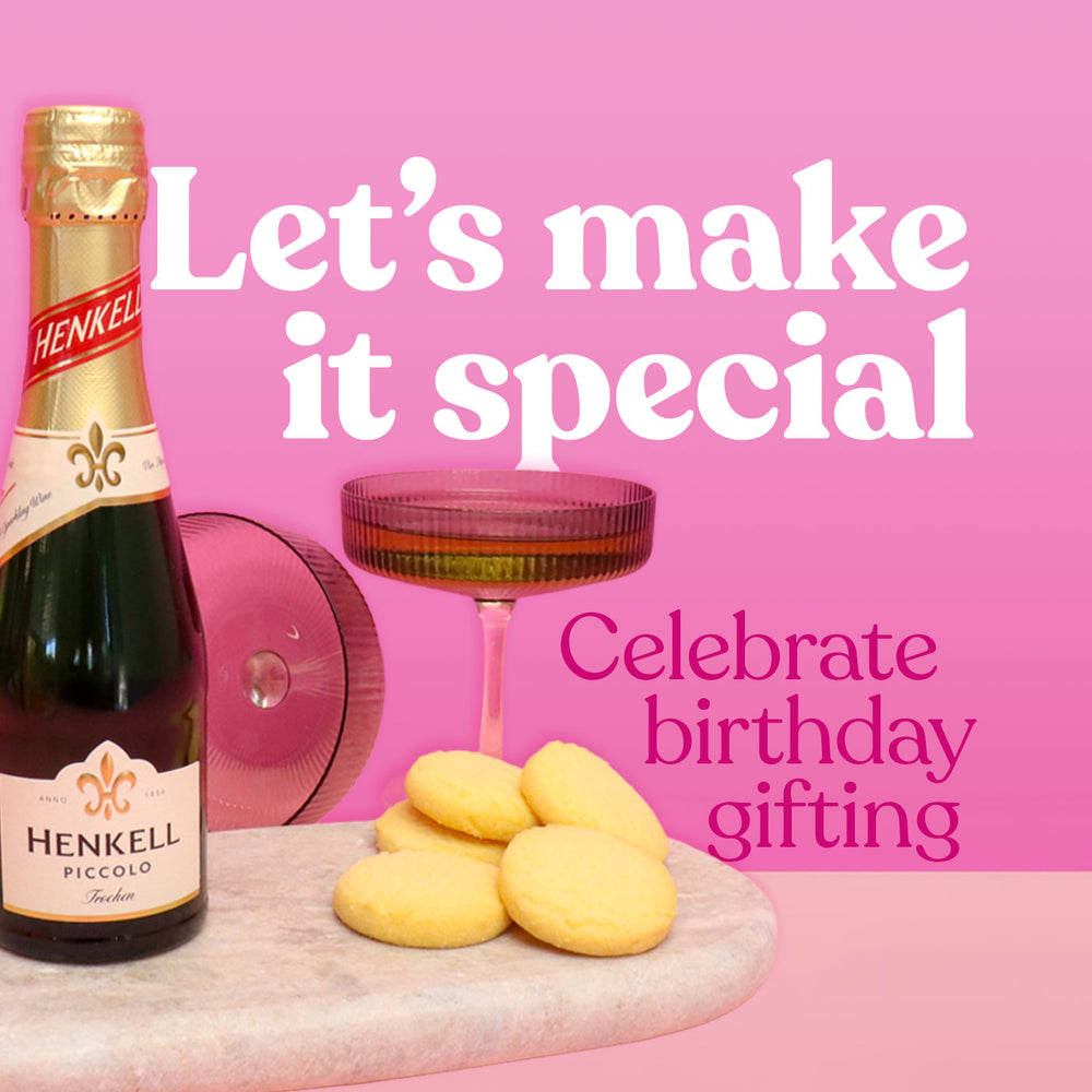 Banner that reads "Let's make it special. Celebrate birthday giving" surrounded with champagne and biscuits on a pink background.