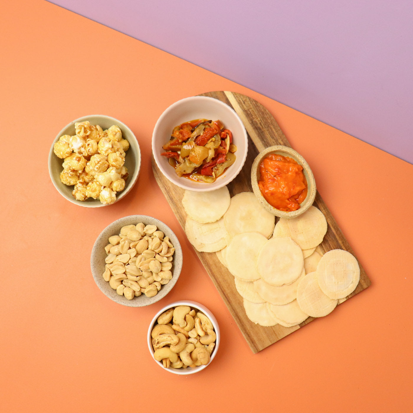 Gourmet gift hamper with olives, antipasti mix, caramel popcorn and nuts