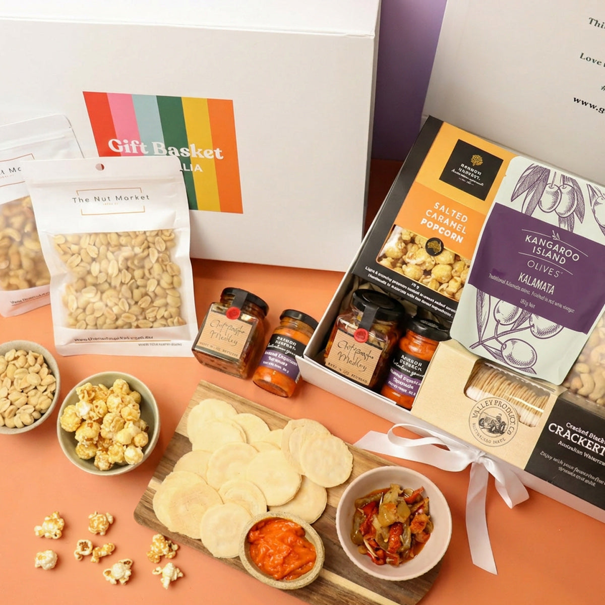 Gourmet gift hamper with olives, antipasti mix, caramel popcorn and nuts