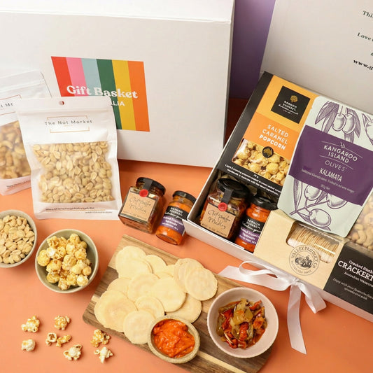 Gourmet gift hamper with olives, antipasti mix, caramel popcorn and nuts