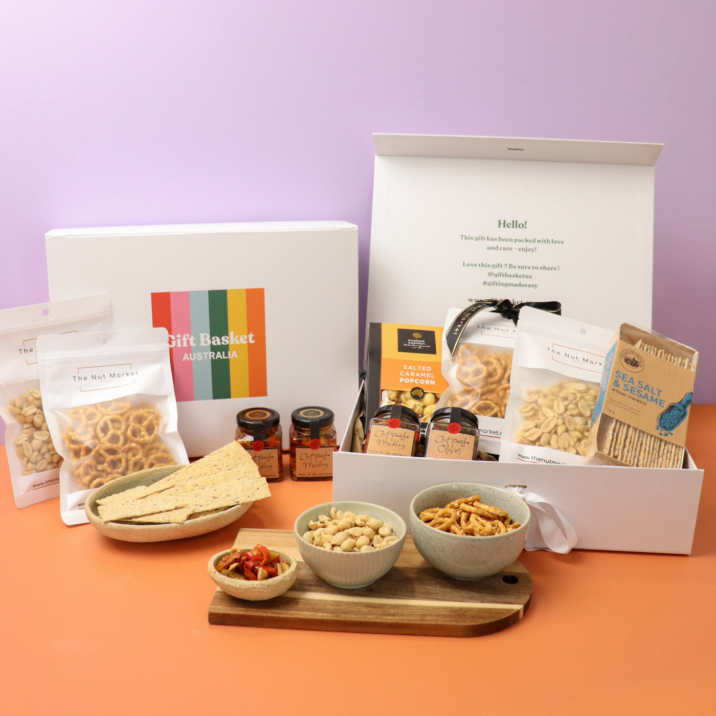 Hamper with a various selection of nuts, olives and antipasti mix