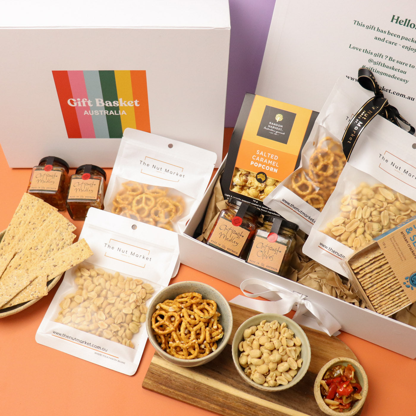Hamper with a various selection of nuts, olives and antipasti mix