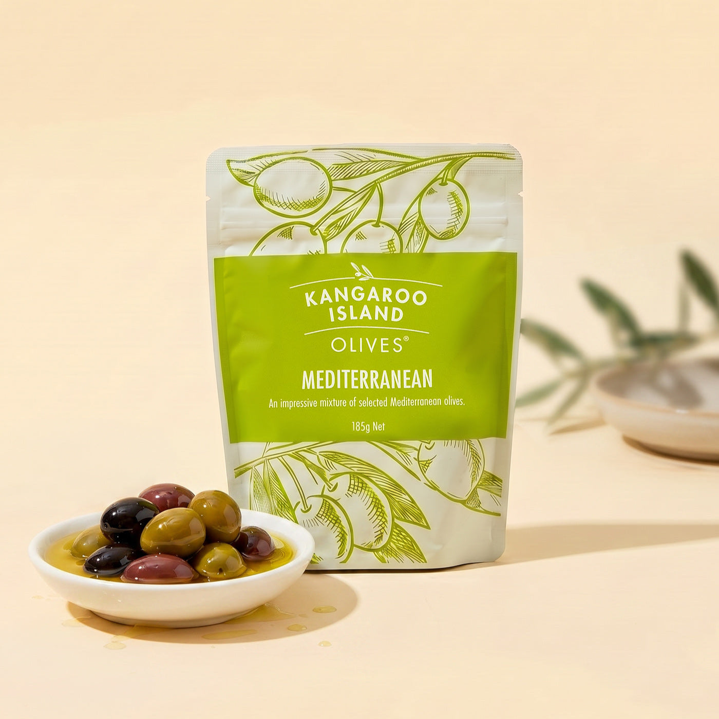 Kangaroo Island Olives Mediterranean olive package with a bowl of olives on a beige background