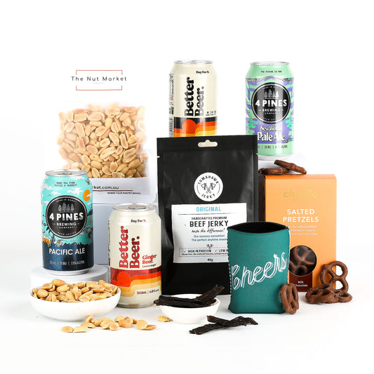 Assorted snacks and beverages including beer cans, nuts, and pretzels on a white background.