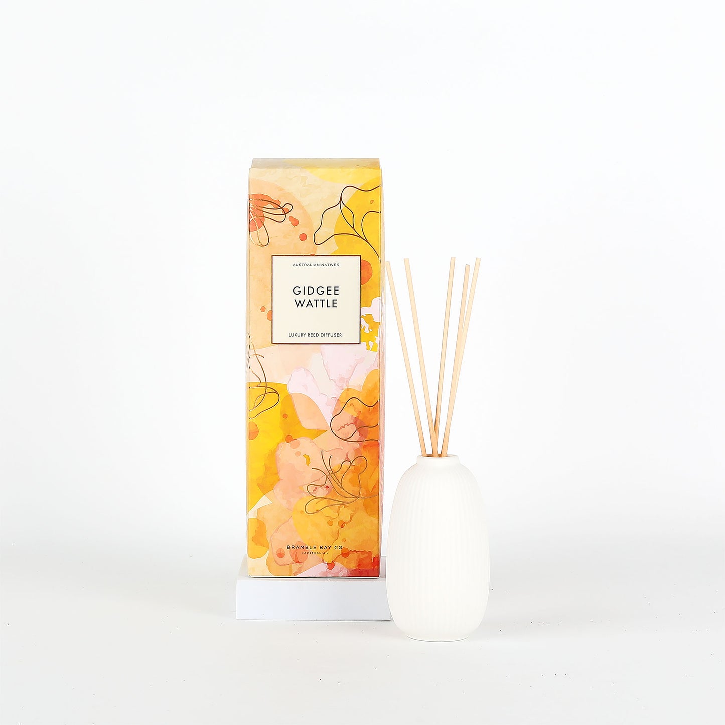 Diffuser with floral packaging on a white background