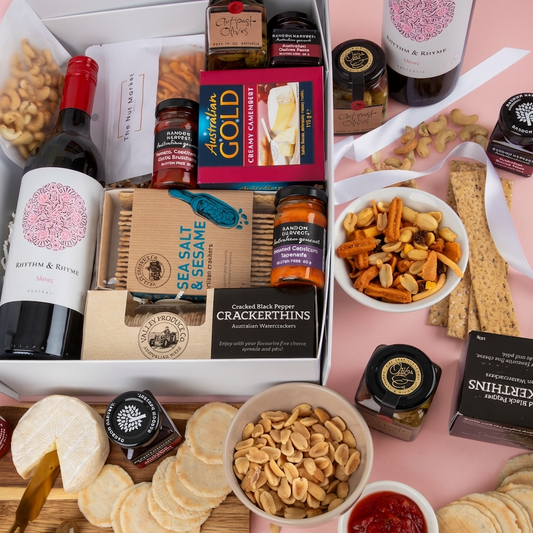 Cheese Platter & wine gift hamper delivered same day. 
Cheese platter and gourmet nibbles with shiraz wine gift hamper.