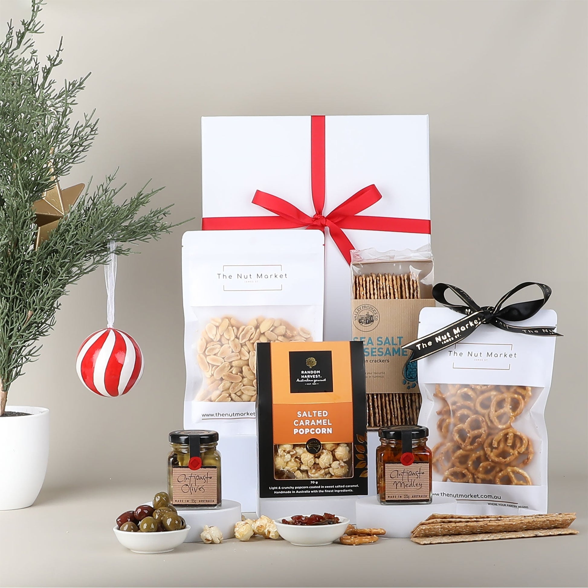 Gourmet gift set with snacks on a neutral background