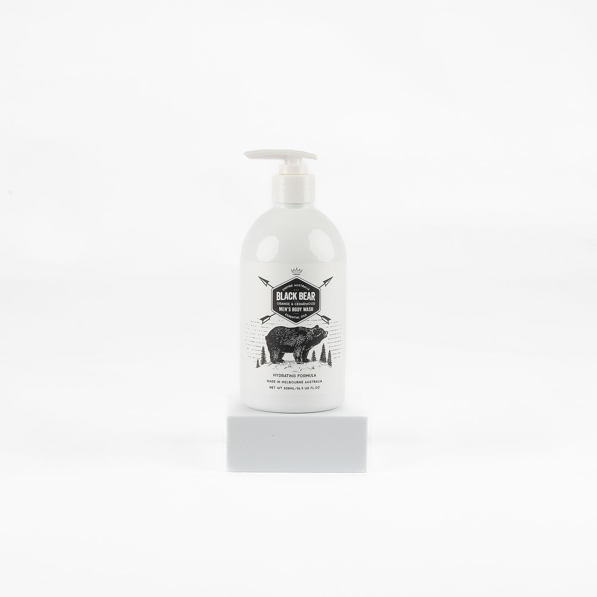 White bottle of men’s body balm on a white background