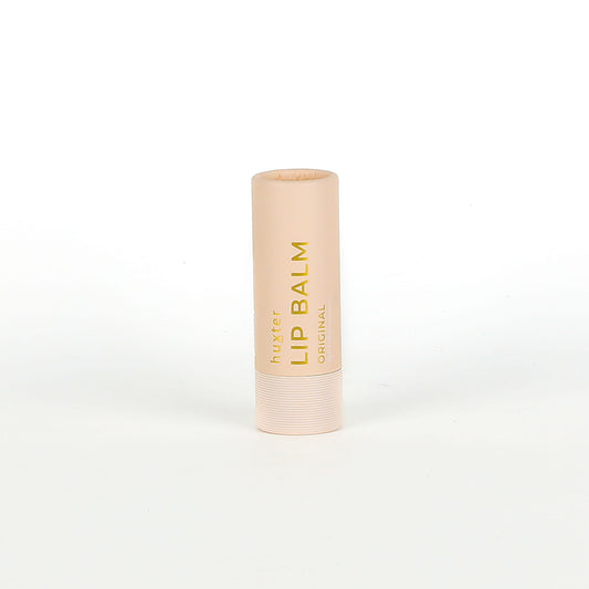 Lip balm tube on a white background