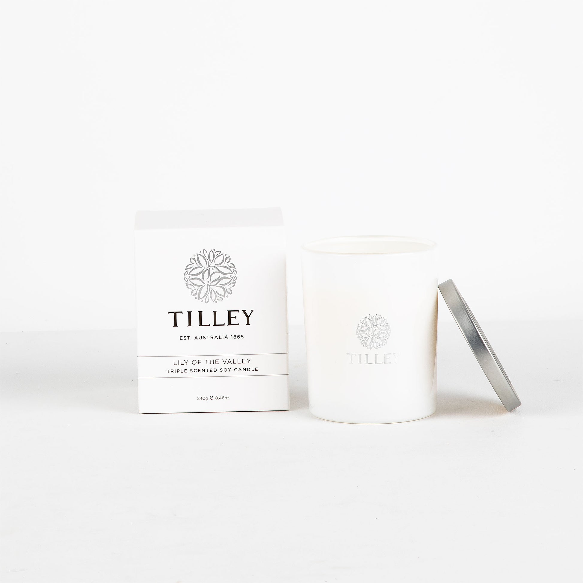 Tilley candle and packaging on a white background
