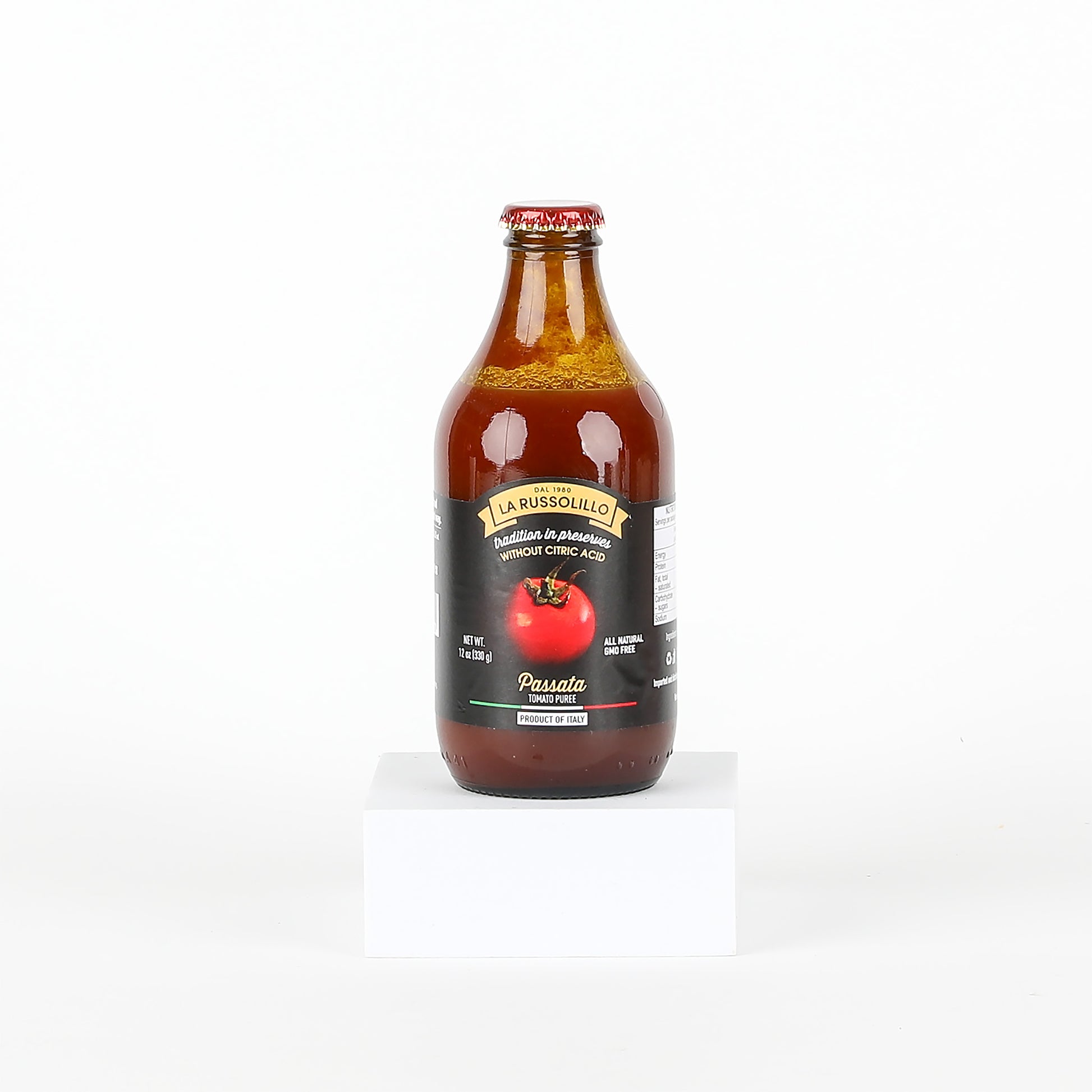 Bottle of La Russolillo tomato passata on a white background
