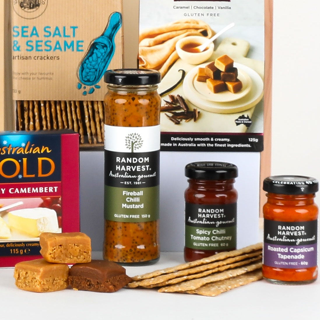 Gourmet gift set with wine, cheese, and snacks in a wooden box.