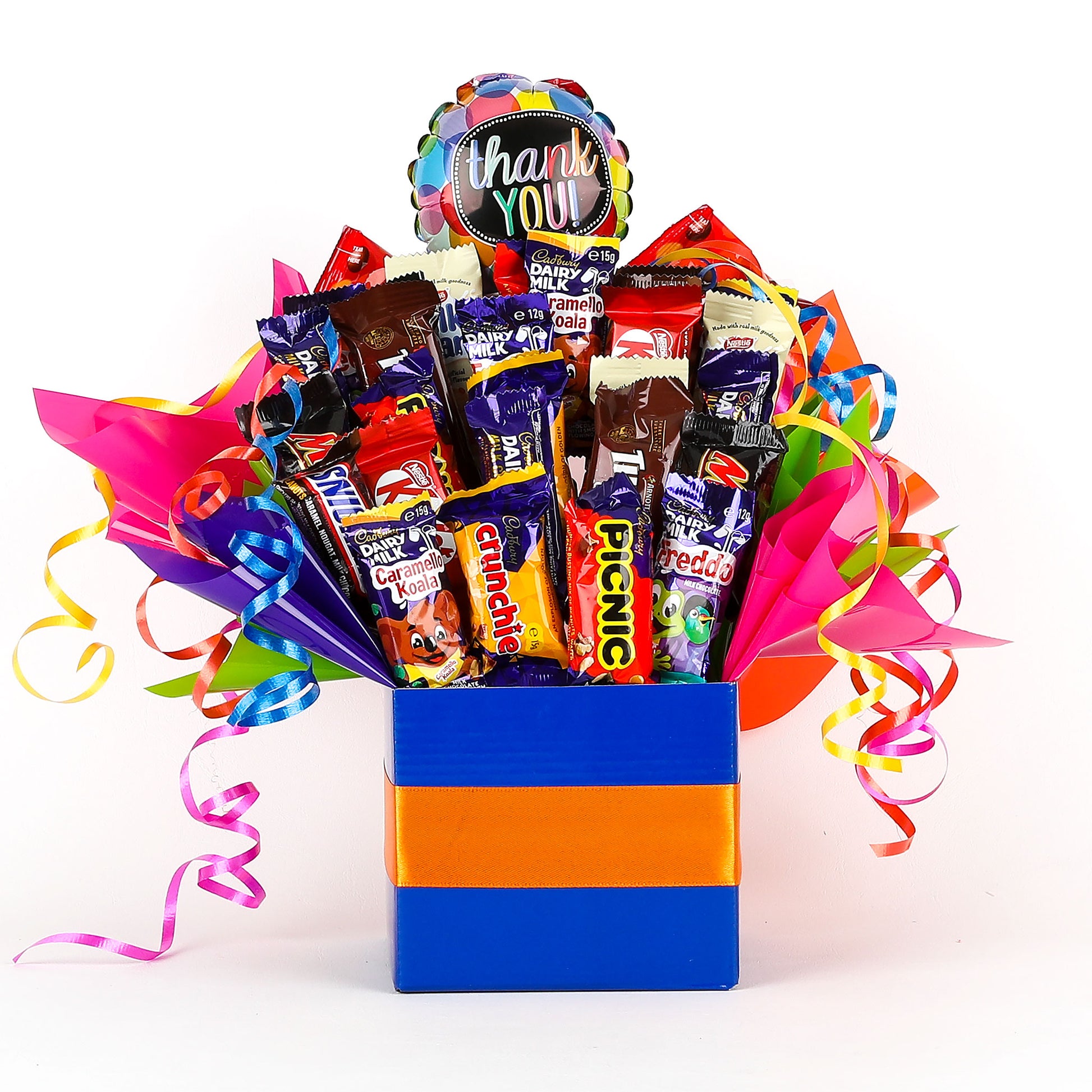 Colorful gift box filled with various chocolates and a thankyou-themed balloon on a white background