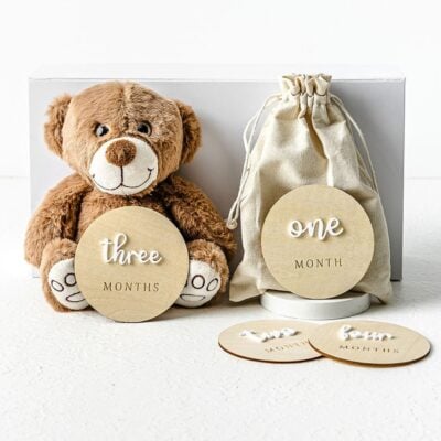 Baby Hamper with one, two, three age tags & a teddy bear.